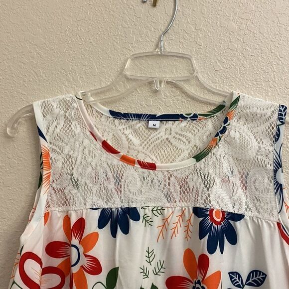 🌸🌺🌸A white dress with colorful floral design the top and back lace design!! - Picture 4 of 6